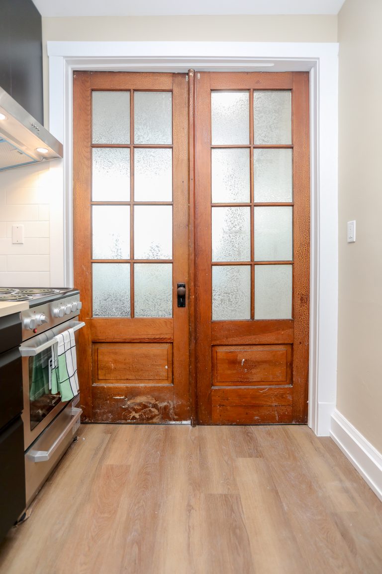 Antique french doors with a natural wood look.