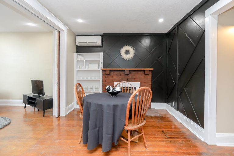 Small dining room with natural wood floors.
