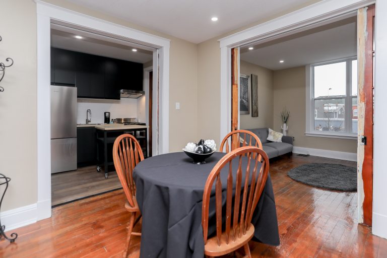 Open concept home with natural wood floors.