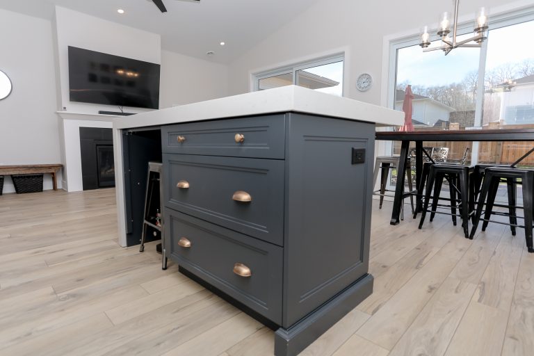 Dark grey cabinetry on kitchen island