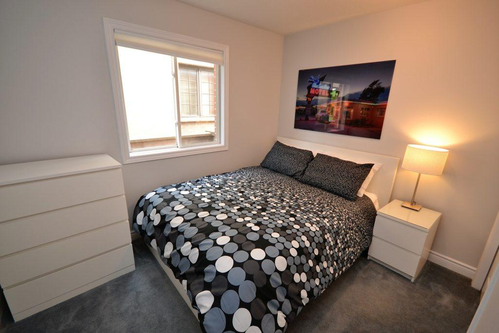 Cozy bedroom with circular pattern.