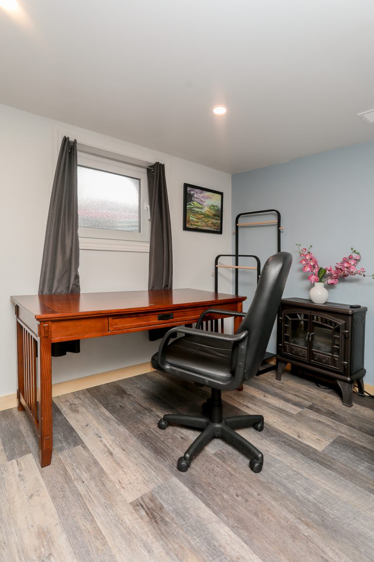 Office set up with natural wood desk